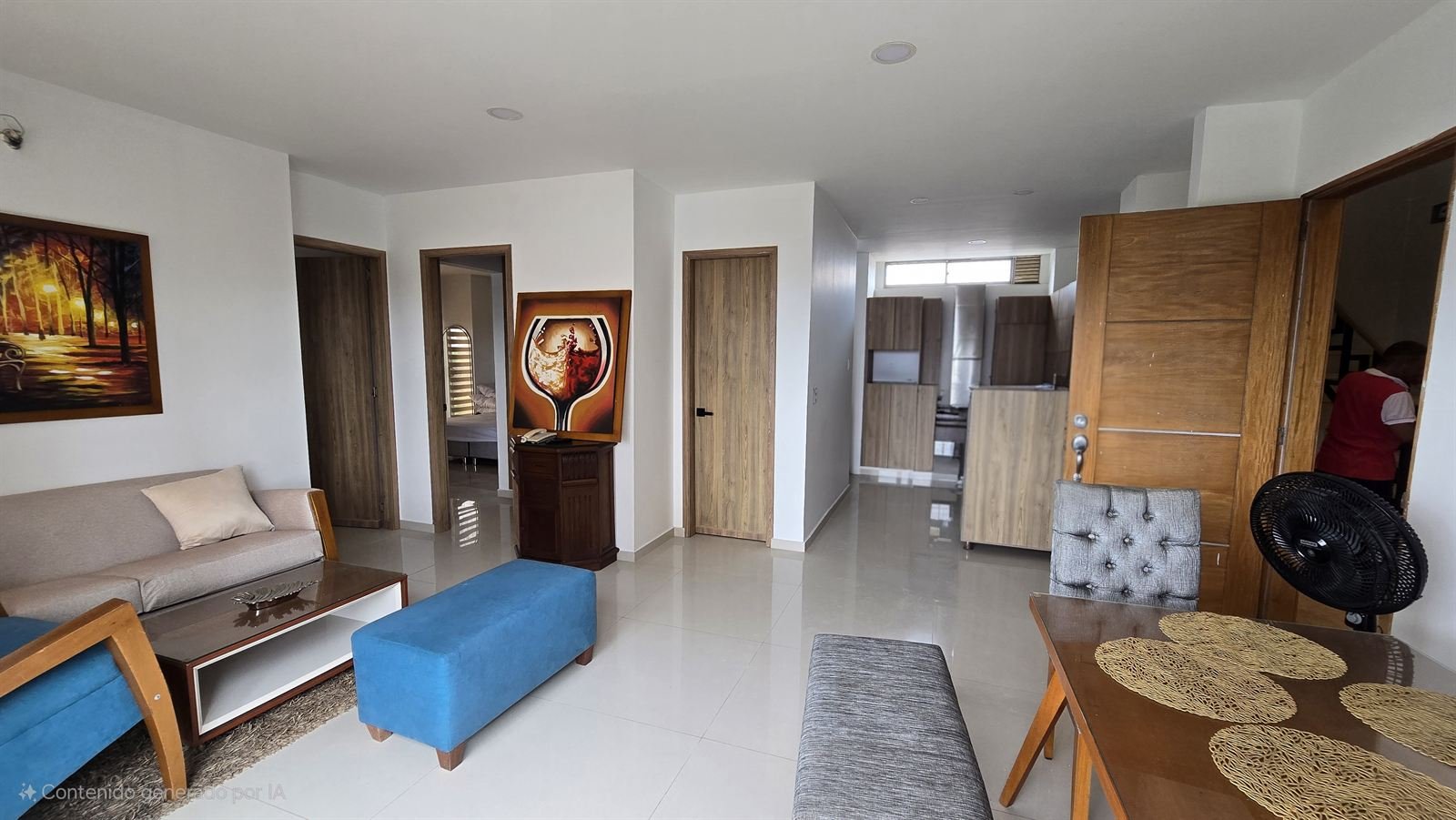 Sala amoblada con sofá y puf azul